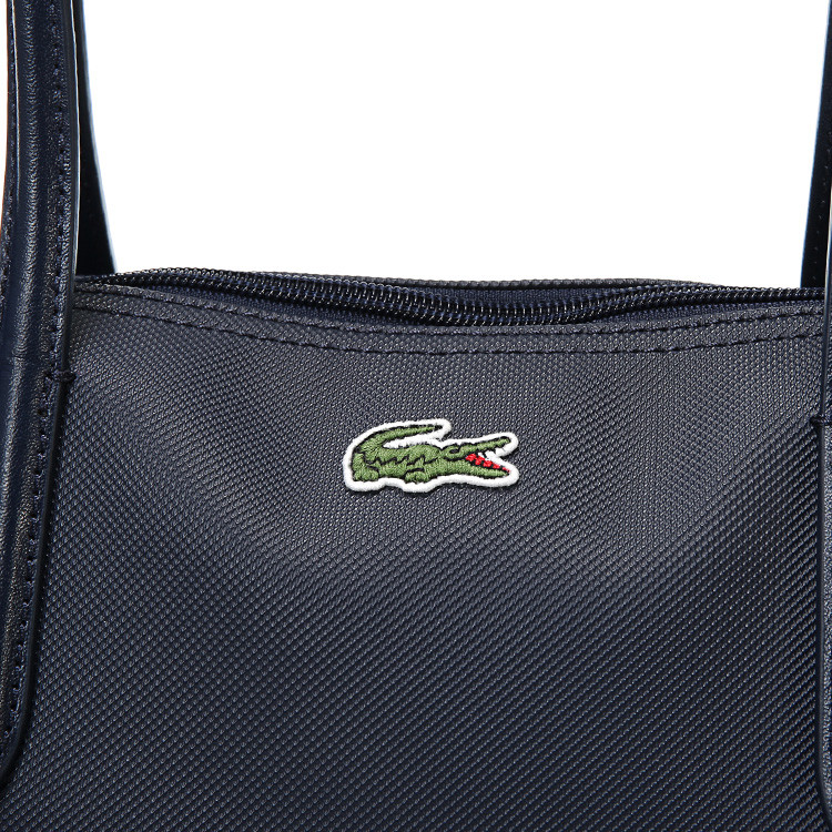 lacoste/鳄鱼女士手提包材质:面料 pvc人造革 辅料 牛剖层革 内料 100