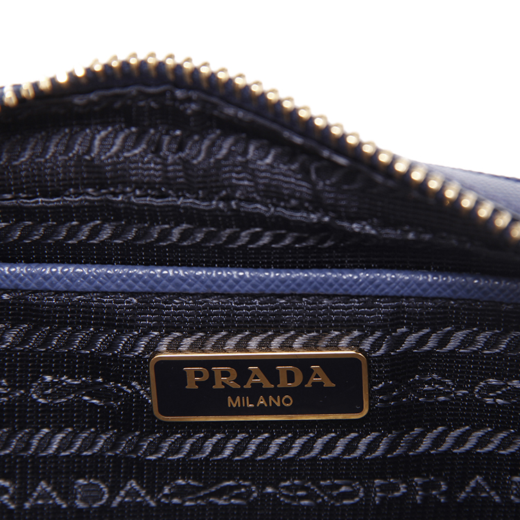 prada/普拉达钴蓝色十字纹牛皮女士新款斜挎包/手拿包1n1674