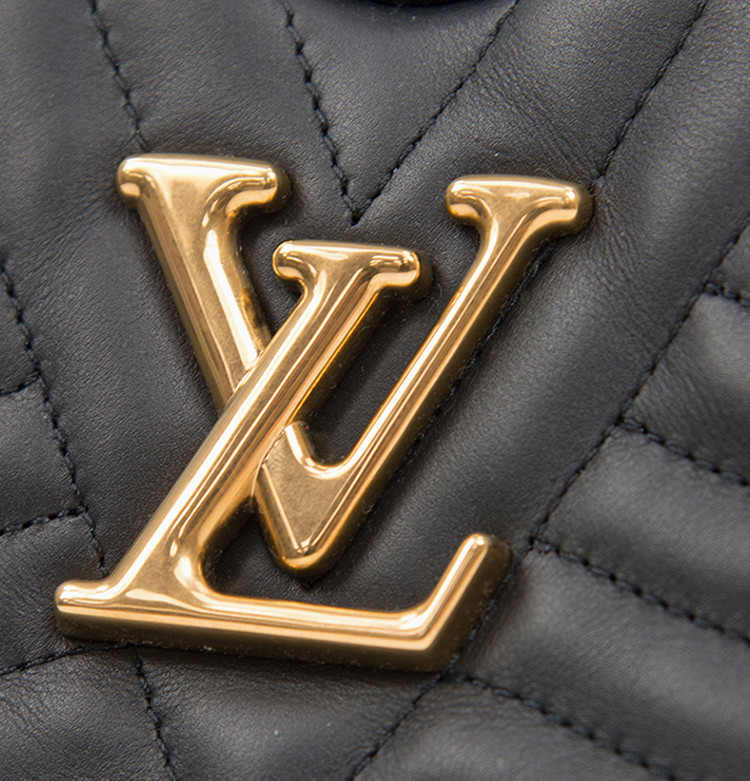 louis vuitton 路易 威登 女士黑色牛皮心形金属logo单肩斜挎包