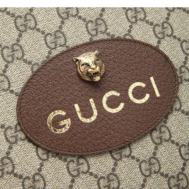 gucci/古驰牛皮双glogo印花图案配金属虎头装饰男士手拿包