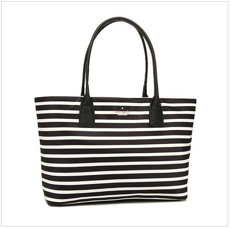 kate spade/凯特·丝蓓 黑白拼色牛皮革女士手提包 pxru5385-071