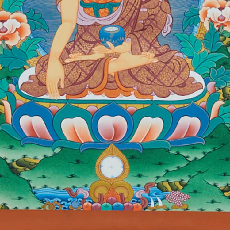 这幅唐卡的底部是摩尼宝,代表财富.