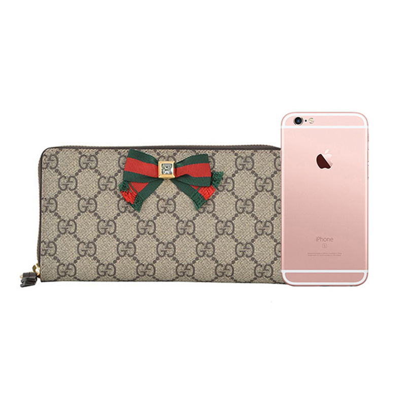 gucci/古驰 钱包经典款女士中号米色系gg标识蝴蝶结装饰pvc配皮革拉链